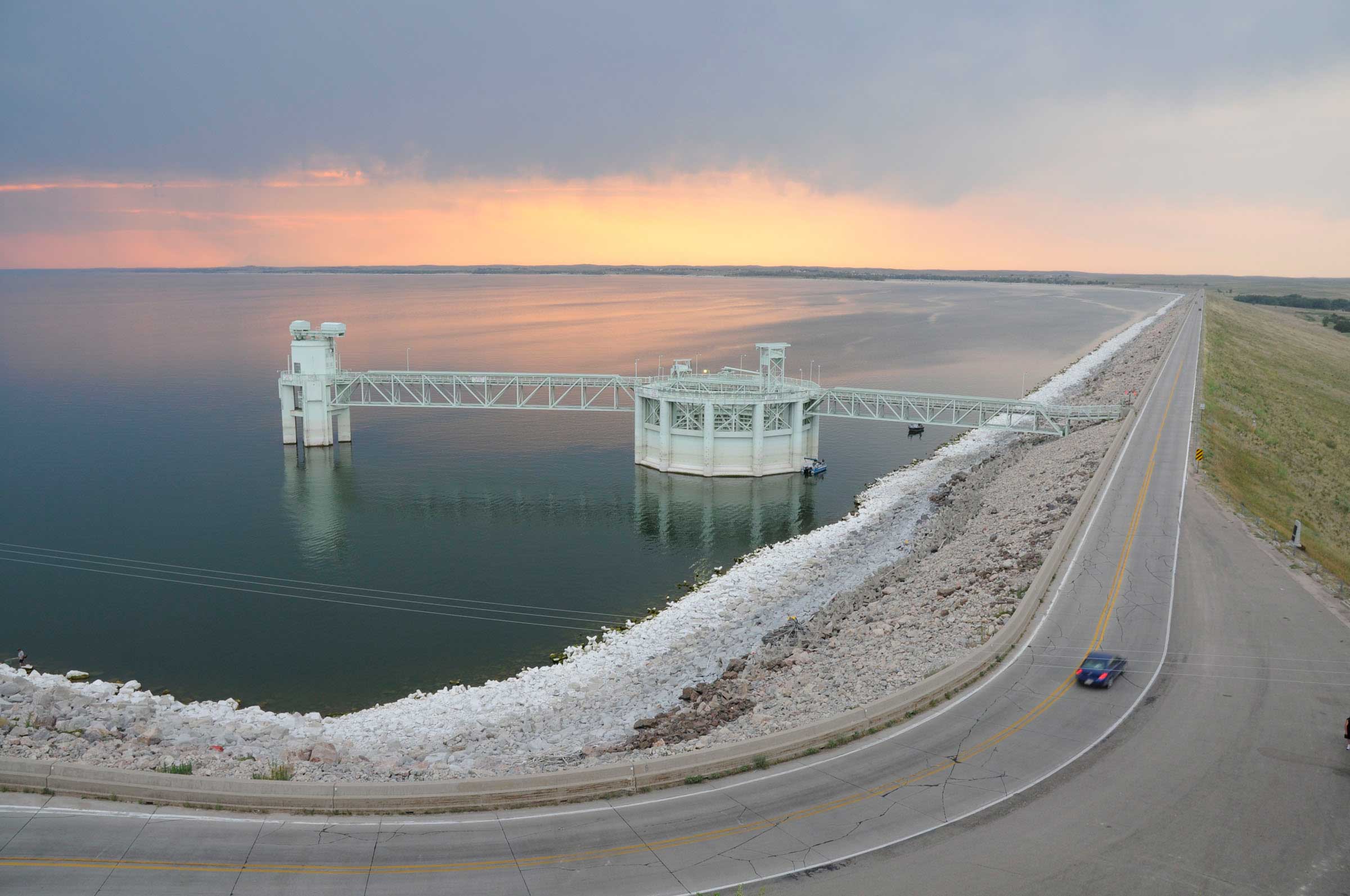 Formed by the Kingsley Dam, Lake McConaughy is one of the largest reservoirs on the North Platte River. Built as a hydro-irrigation project for the Central Nebraska Public Power and Irrigation District (CNPPID), Lake McConaughy is 22 miles long and 4 miles wide and diverts water into the Supply Canal which is directed through several lakes, hydroelectric plants, and an irrigation system during irrigation season or back to the Platte River during non-irrigation season. This camera shows the tower structure used to release water from the lake.