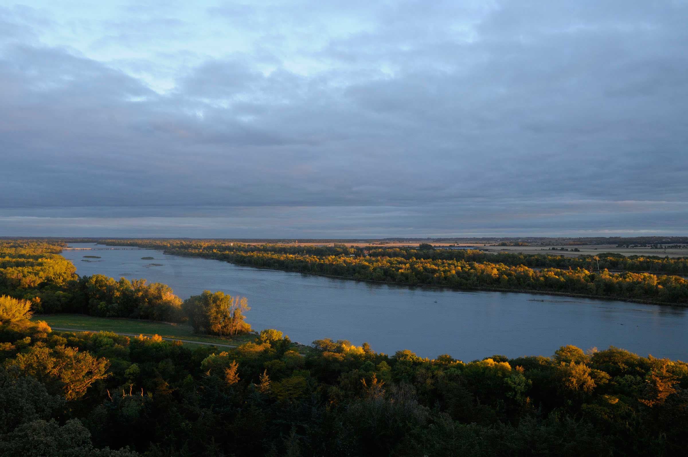 Located on the observation tower at Mahoney State Park between Lincoln and Omaha, this location gives a bird's eye view of the Lower Platte River Valley and surrounding wooded bluffs. The river here is mostly fed by groundwater from the Loup Basin which drains a large portion of the Nebraska Sandhills, entering the Platte near Columbus, Nebraska. The location is also very near Lincoln's well field where the city of 250,000 draws the majority of its water supply.